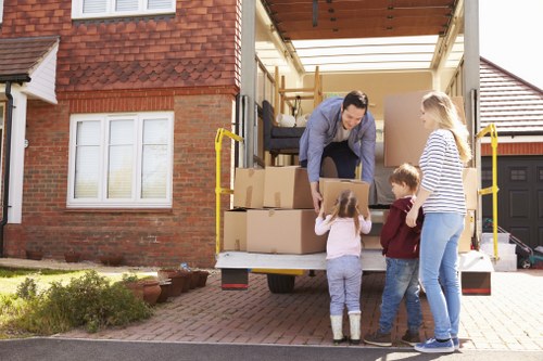Professional movers handling residential items